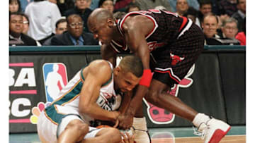 Michael Jordan, Grant Hill, Chicago Bulls (Photo credit should read MATT CAMPBELL/AFP via Getty Images)