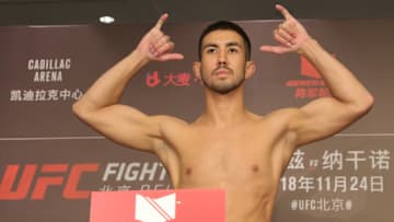 BEIJING, CHINA - NOVEMBER 23: Louis Smolka poses on the scale during the UFC Fight Night weigh-in at Wanda Realm Hotel on November 23, 2018 in Beijing, China. (Photo by Emmanuel Wong/Getty Images)