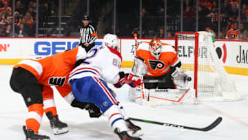 PHILADELPHIA, PA - JANUARY 16: Alex Lyon #34 of the Philadelphia Flyers makes a save against Artturi Lehkonen #62 of the Montreal Canadiens in the second period at the Wells Fargo Center on January 16, 2020 in Philadelphia, Pennsylvania. (Photo by Mitchell Leff/Getty Images)