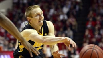 Feb 11, 2016; Bloomington, IN, USA; Iowa Hawkeyes guard Mike Gesell (10) passes the ball to a teammate during the second period of the game at Assembly Hall. Indiana Hoosiers defeated the Iowa Hawkeyes 85 to 78. Mandatory Credit: Marc Lebryk-USA TODAY Sports