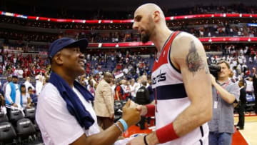 May 15, 2014; Washington, DC, USA; Washington Wizards center Marcin Gortat (4) shakes hands with Goodman League commissioner Miles Rawls (L) after the Wizards game against the Indiana Pacers in game six of the second round of the 2014 NBA Playoffs at Verizon Center. The Pacers won 93-80, and won the series 4-2. Mandatory Credit: Geoff Burke-USA TODAY Sports