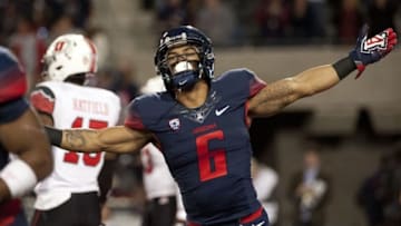 Nov 14, 2015; Tucson, AZ, USA; Arizona Wildcats wide receiver Nate Phillips (6) celebrates after scoring a touchdown against the Utah Utes during the second overtime at Arizona Stadium. Arizona won 37-30 in double overtime. Mandatory Credit: Casey Sapio-USA TODAY Sports