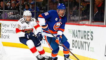NEW YORK, NY - OCTOBER 24: Andrew Ladd #16 of the New York Islanders skates against Bogdan Kiselevich #55 of the Florida Panthers at Barclays Center on October 24, 2018 the Brooklyn borough of New York City. Florida Panthers defeated the New York Islanders 3-2 in OT. (Photo by Mike Stobe/NHLI via Getty Images)