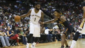 Oct 9, 2015; Jacksonville, FL, USA; Atlanta Hawks guard Kent Bazemore (24) defends New Orleans Pelicans guard Tyreke Evans (1) during the third quarter at Veterans Memorial Arena. The Atlanta Hawks won 103-93. Mandatory Credit: Logan Bowles-USA TODAY Sports