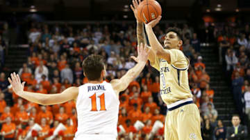 CHARLOTTESVILLE, VA - FEBRUARY 27: Michael Devoe #0 of the Georgia Tech Yellow Jackets shoots over Ty Jerome #11 of the Virginia Cavaliers in the first half during a game at John Paul Jones Arena on February 27, 2019 in Charlottesville, Virginia. (Photo by Ryan M. Kelly/Getty Images)