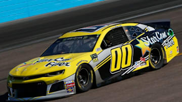 AVONDALE, ARIZONA - NOVEMBER 08: Landon Cassill, driver of the #00 StarCom Fiber Chevrolet, practices for the Monster Energy NASCAR Cup Series Bluegreen Vacations 500 at ISM Raceway on November 08, 2019 in Avondale, Arizona. (Photo by Jonathan Ferrey/Getty Images)