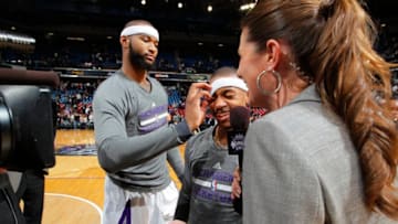 SACRAMENTO, CA - JANUARY 12: DeMarcus Cousins #15 and Isaiah Thomas #22 of the Sacramento Kings after defeating the Cleveland Cavaliers on January 12, 2014 at Sleep Train Arena in Sacramento, California. NOTE TO USER: User expressly acknowledges and agrees that, by downloading and or using this photograph, User is consenting to the terms and conditions of the Getty Images Agreement. Mandatory Copyright Notice: Copyright 2014 NBAE (Photo by Rocky Widner/NBAE via Getty Images)