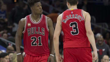 PHILADELPHIA, PA - JANUARY 14: Jimmy Butler #21 and Doug McDermott #3 of the Chicago Bulls react after a made basket against the Philadelphia 76ers on January 14, 2016 at the Wells Fargo Center in Philadelphia, Pennsylvania. The Bulls defeated the 76ers 115-111. NOTE TO USER: User expressly acknowledges and agrees that, by downloading and or using this photograph, User is consenting to the terms and conditions of the Getty Images License Agreement. (Photo by Mitchell Leff/Getty Images)