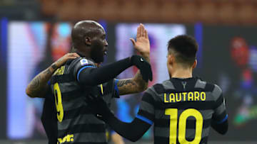 MILAN, ITALY - JANUARY 30: Romelu Lukaku of FC Internazionale celebrates his goal with his team-mate Lautaro Martinez during the Serie A match between FC Internazionale and Benevento Calcio at Stadio Giuseppe Meazza on January 30, 2021 in Milan, Italy. (Photo by Marco Luzzani/Getty Images)