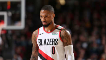 PORTLAND, OR - FEBRUARY 1: Damian Lillard #0 of the Portland Trail Blazers looks on during a game against the Utah Jazz on February 01, 2020 at the Moda Center Arena in Portland, Oregon. NOTE TO USER: User expressly acknowledges and agrees that, by downloading and or using this photograph, user is consenting to the terms and conditions of the Getty Images License Agreement. Mandatory Copyright Notice: Copyright 2020 NBAE (Photo by Sam Forencich/NBAE via Getty Images)