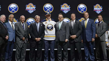 Jun 26, 2015; Sunrise, FL, USA; Jack Eichel poses with team executives after being selected as the number two overall pick to the Buffalo Sabres in the first round of the 2015 NHL Draft at BB&T Center. Mandatory Credit: Steve Mitchell-USA TODAY Sports