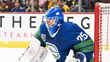 VANCOUVER, BC - FEBRUARY 22: Goalie Jacob Markstrom #25 of the Vancouver Canucks readies to make a save during NHL action against the Boston Bruins at Rogers Arena on February 22, 2020 in Vancouver, Canada. (Photo by Rich Lam/Getty Images)