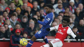 LONDON, ENGLAND - DECEMBER 29: Tariq Lamptey of Chelsea and Buyako Saka of Arsenal during the Premier League match between Arsenal FC and Chelsea FC at Emirates Stadium on December 29, 2019 in London, United Kingdom. (Photo by Robin Jones/Getty Images)