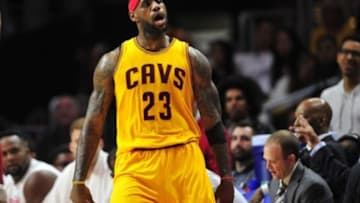 January 16, 2015; Los Angeles, CA, USA; Cleveland Cavaliers forward LeBron James (23) reacts after he shoots a basket against the Los Angeles Clippers during the second half at Staples Center. Mandatory Credit: Gary A. Vasquez-USA TODAY Sports