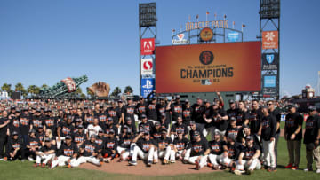 SAN FRANCISCO, CALIFORNIA - OCTOBER 03: San Francisco Giants pose for a team picture in celebration of winning the NL West Division after a game against the San Diego Padres at Oracle Park on October 03, 2021 in San Francisco, California. (Photo by Brandon Vallance/Getty Images)