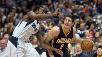 Nov 24, 2014; Dallas, TX, USA; Dallas Mavericks forward Al-Farouq Aminu (7) guards Indiana Pacers forward Damjan Rudez (9) during the first half at the American Airlines Center. Mandatory Credit: Jerome Miron-USA TODAY Sports