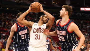 Jan 26, 2023; Houston, Texas, USA; Cleveland Cavaliers center Jarrett Allen (31) grabs a defensive rebound against Houston Rockets center Alperen Sengun (28) in the second quarter at Toyota Center. Mandatory Credit: Thomas Shea-USA TODAY Sports