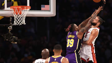 Dwight Howard #39 of the Los Angeles Lakers defends against Caleb Martin #16 of the Miami Heat(Photo by Sean M. Haffey/Getty Images)