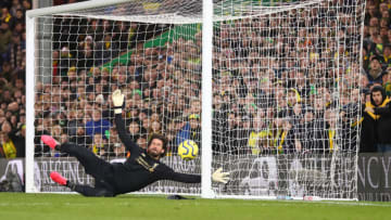 NORWICH, ENGLAND - FEBRUARY 15: Alisson Becker of Liverpool looks to save a shot during the Premier League match between Norwich City and Liverpool FC at Carrow Road on February 15, 2020 in Norwich, United Kingdom. (Photo by Catherine Ivill/Getty Images)