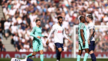 LONDON, ENGLAND - APRIL 16: Enock Mwepu of Brighton & Hove Albion and Pierre-Emile Hojbjerg of Tottenham Hotspur clash as Ben Davies of Tottenham Hotspur lays injured during the Premier League match between Tottenham Hotspur and Brighton & Hove Albion at Tottenham Hotspur Stadium on April 16, 2022 in London, England. (Photo by Ryan Pierse/Getty Images)