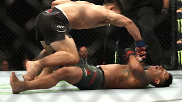 LAS VEGAS, NEVADA - JULY 06: Song Yadong of China knocks out Alejandro Perez of Mexico during their UFC 239 Bantamweight bout at T-Mobile Arena on July 06, 2019 in Las Vegas, Nevada. (Photo by Sean M. Haffey/Getty Images)