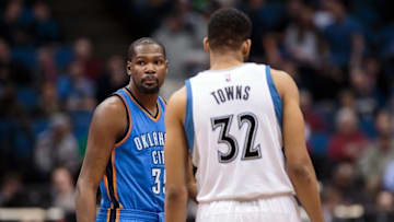 Jan 27, 2016; Minneapolis, MN, USA; Oklahoma City Thunder forward Kevin Durant (35) and Minnesota Timberwolves center Karl-Anthony Towns (32) before the game at Target Center. Mandatory Credit: Brad Rempel-USA TODAY Sports