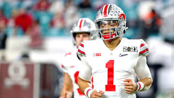 Jan 11, 2021; Miami Gardens, Florida, USA; Ohio State Buckeyes quarterback Justin Fields (1) warms up before playing the Alabama Crimson Tide in the 2021 College Football Playoff National Championship Game. Mandatory Credit: Kim Klement-USA TODAY Sports