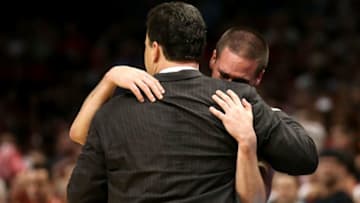 LOS ANGELES, CA - MARCH 28: Head coach Sean Miller hugs T.J. McConnell