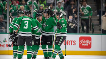 Nov 26, 2021; Dallas, Texas, USA; Dallas Stars defenseman Ryan Suter (20) and center Joe Pavelski (16) and left wing Roope Hintz (24) and left wing Jason Robertson (21) and defenseman John Klingberg (3) celebrate PavelskiÕs first goal against the Colorado Avalanche during the first period at the American Airlines Center. Mandatory Credit: Jerome Miron-USA TODAY Sports