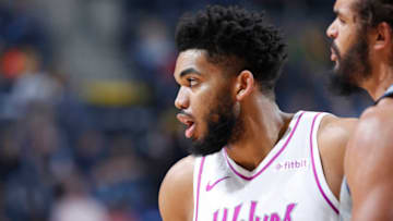 MEMPHIS, TN - MARCH 23: Karl-Anthony Towns #32 of the Minnesota Timberwolves looks on against the Memphis Grizzlies during the game at FedExForum on March 23, 2019 in Memphis, Tennessee. Minnesota won 112-99. NOTE TO USER: User expressly acknowledges and agrees that, by downloading and or using the photograph, User is consenting to the terms and conditions of the Getty Images License Agreement. (Photo by Joe Robbins/Getty Images)