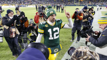 Jan 1, 2023; Green Bay, Wisconsin, USA; Green Bay Packers quarterback Aaron Rodgers (12) walks off the field following the game against the Minnesota Vikings at Lambeau Field. Mandatory Credit: Jeff Hanisch-USA TODAY Sports