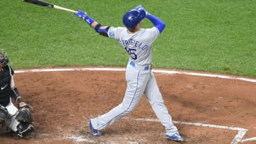 BALTIMORE, MD - AUGUST 19: Whit Merrifield #15 of the Kansas City Royals takes a swing during a baseball game against the Baltimore Orioles at Oriole Park at Camden Yards on August 19 2019 in Baltimore, Maryland. (Photo by Mitchell Layton/Getty Images)