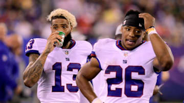 EAST RUTHERFORD, NJ - OCTOBER 11: Odell Beckham #13 and Saquon Barkley #26 of the New York Giants react against the Philadelphia Eagles at MetLife Stadium on October 11, 2018 in East Rutherford, New Jersey. The Eagles defeated the Giants 34-13. (Photo by Steven Ryan/Getty Images)
