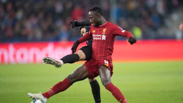 SALZBURG, AUSTRIA - DECEMBER 10: Takumi Minamino of FC Salzburg (L) and Naby Keita of Liverpool FC (R)during the UEFA Champions League group E match between RB Salzburg and Liverpool FC at on December 10, 2019 in Salzburg, Austria. (Photo by Andreas Schaad/Getty Images)