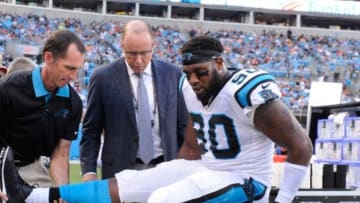 Aug 22, 2015; Charlotte, NC, USA; Carolina Panthers defensive end Frank Alexander (90) is injured during the first half of the game at Bank of America Stadium. Mandatory Credit: Sam Sharpe-USA TODAY Sports