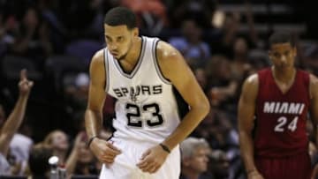 Oct 18, 2014; San Antonio, TX, USA; San Antonio Spurs small forward Austin Daye (23) reacts after a shot against the Miami Heat during the second half at AT&T Center. The Heat won 111-108 in overtime. Mandatory Credit: Soobum Im-USA TODAY Sports
