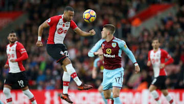 SOUTHAMPTON, ENGLAND - NOVEMBER 04: Nathan Redmond of Southampton heads the ball away from Johann Gudmundsson of Burnley during the Premier League match between Southampton and Burnley at St Mary's Stadium on November 4, 2017 in Southampton, England. (Photo by Steve Bardens/Getty Images)