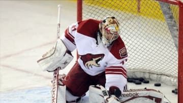 Jan 24, 2014; Edmonton, Alberta, CAN; Phoenix Coyotes goalie Mike Smith (41) warms up before the game against the Edmonton Oilers at Rexall Place. Mandatory Credit: Candice Ward-USA TODAY Sports