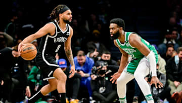 NEW YORK, NEW YORK - FEBRUARY 08: Patty Mills #8 of the Brooklyn Nets is defended by Jaylen Brown #7 of the Boston Celtics at Barclays Center on February 08, 2022 in New York City. NOTE TO USER: User expressly acknowledges and agrees that, by downloading and or using this photograph, User is consenting to the terms and conditions of the Getty Images License Agreement. (Photo by Steven Ryan/Getty Images)