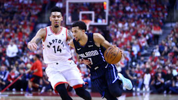 TORONTO, ON - APRIL 13: Michael Carter-Williams #7 of the Orlando Magic dribbles the ball as Danny Green #14 of the Toronto Raptors defends during Game One of the first round of the NBA playoffs at Scotiabank Arena on April 13, 2019 in Toronto, Canada. NOTE TO USER: User expressly acknowledges and agrees that, by downloading and or using this photograph, User is consenting to the terms and conditions of the Getty Images License Agreement. (Photo by Vaughn Ridley/Getty Images)