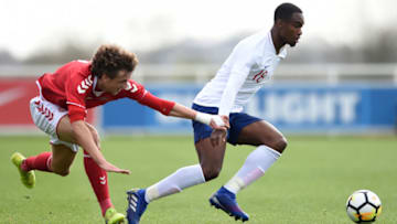 BURTON-UPON-TRENT, ENGLAND - MARCH 26: Rekeem Harper of England evades Nicolas Madsen of Denmark during the UEFA U19 Championship qualifying match between England and Denmark at St Georges Park on March 26, 2019 in Burton-upon-Trent, England. (Photo by Nathan Stirk/Getty Images)