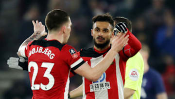 SOUTHAMPTON, ENGLAND - JANUARY 25: Pierre-Emile Hojbjerg congratulates team-mate Sofiane Boufal of Southampton after he scores a goal to make it 1-1 during the FA Cup Fourth Round match between Southampton and Tottenham Hotspur at St. Mary's Stadium on January 25, 2020 in Southampton, England. (Photo by Robin Jones/Getty Images)