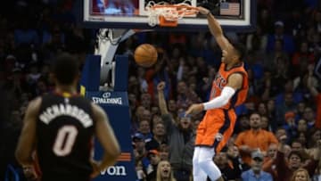 Jan 17, 2016; Oklahoma City, OK, USA; Oklahoma City Thunder guard Russell Westbrook (0) dunks the ball against the Miami Heat during the second quarter at Chesapeake Energy Arena. Mandatory Credit: Mark D. Smith-USA TODAY Sports