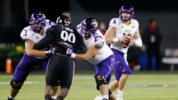 Holton Ahlers of the East Carolina Pirates drops back to pass against the Cincinnati Bearcats. Getty Images.