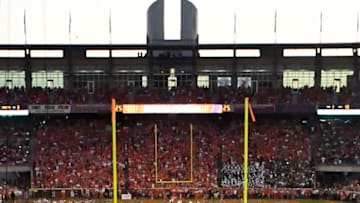 CLEMSON, SOUTH CAROLINA - SEPTEMBER 21: Head coach Dabo Swinney of the Clemson Tigers touches Howard's Rock prior to the start of the Tigers' football game against the Charlotte 49ers at Memorial Stadium on September 21, 2019 in Clemson, South Carolina. (Photo by Mike Comer/Getty Images)