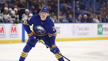 Mar 4, 2022; Buffalo, New York, USA; Buffalo Sabres defenseman Rasmus Dahlin (26) looks to make a pass during the second period against the Minnesota Wild at KeyBank Center. Mandatory Credit: Timothy T. Ludwig-USA TODAY Sports