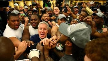 Feb 2, 2014; East Rutherford, NJ, USA; Seattle Seahawks head coach Pete Carroll celebrates in the locker room with his players after Super Bowl XLVIII against the Denver Broncos at MetLife Stadium. Mandatory Credit: Mark J. Rebilas-USA TODAY Sports