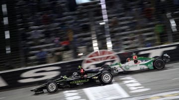 FORT WORTH, TEXAS - JUNE 08: Josef Newgarden of the United States, driver of the #2 Fitzgerald USA Team Penske Chevrolet, and Alexander Rossi of the United States, driver of the #27 GESS/Capstone Honda, race during the NTT IndyCar Series DXC Technology 600 at Texas Motor Speedway on June 08, 2019 in Fort Worth, Texas. (Photo by Chris Graythen/Getty Images)