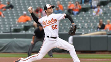 Sep 30, 2015; Baltimore, MD, USA; Baltimore Orioles starting pitcher Miguel Gonzalez (50) pitches during the first inning against the Toronto Blue Jays at Oriole Park at Camden Yards. Mandatory Credit: Tommy Gilligan-USA TODAY Sports