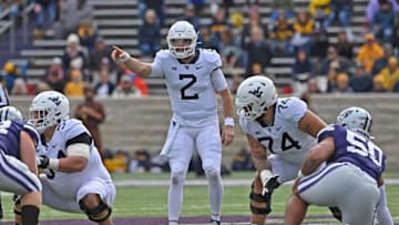 MANHATTAN, KS - NOVEMBER 13: Quarterback Jarret Doege #2 of the West Virginia Mountaineers calls out a play during the first half against the Kansas State Wildcats at Bill Snyder Family Football Stadium on November 13, 2021 in Manhattan, Kansas. (Photo by Peter G. Aiken/Getty Images)